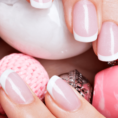 73acb3f9 beautiful woman s nails with beautiful french white manicure 1 min.png