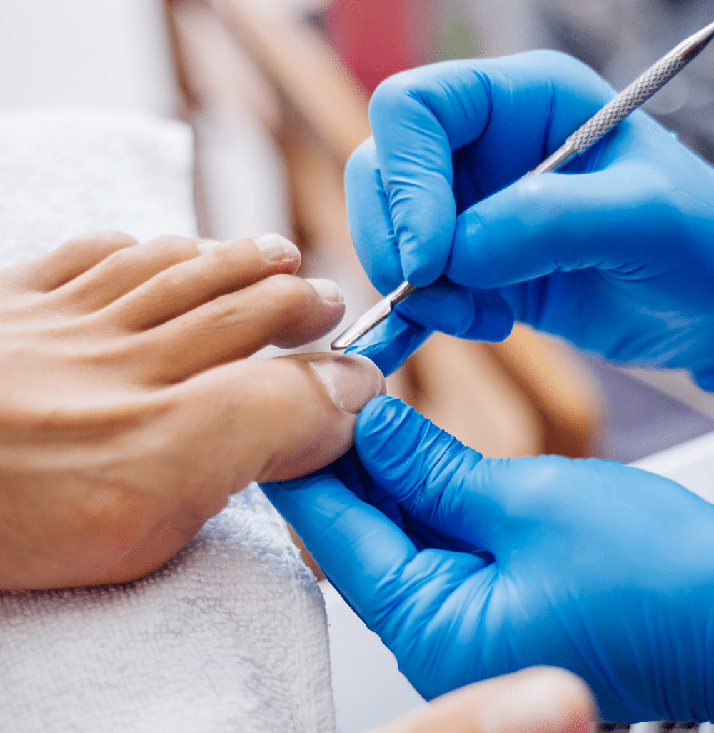 e82b1e66 pedicure process home salon pedicure foot care treatment nail process professional pedicures master blue gloves make pedicure 1 min.jpg